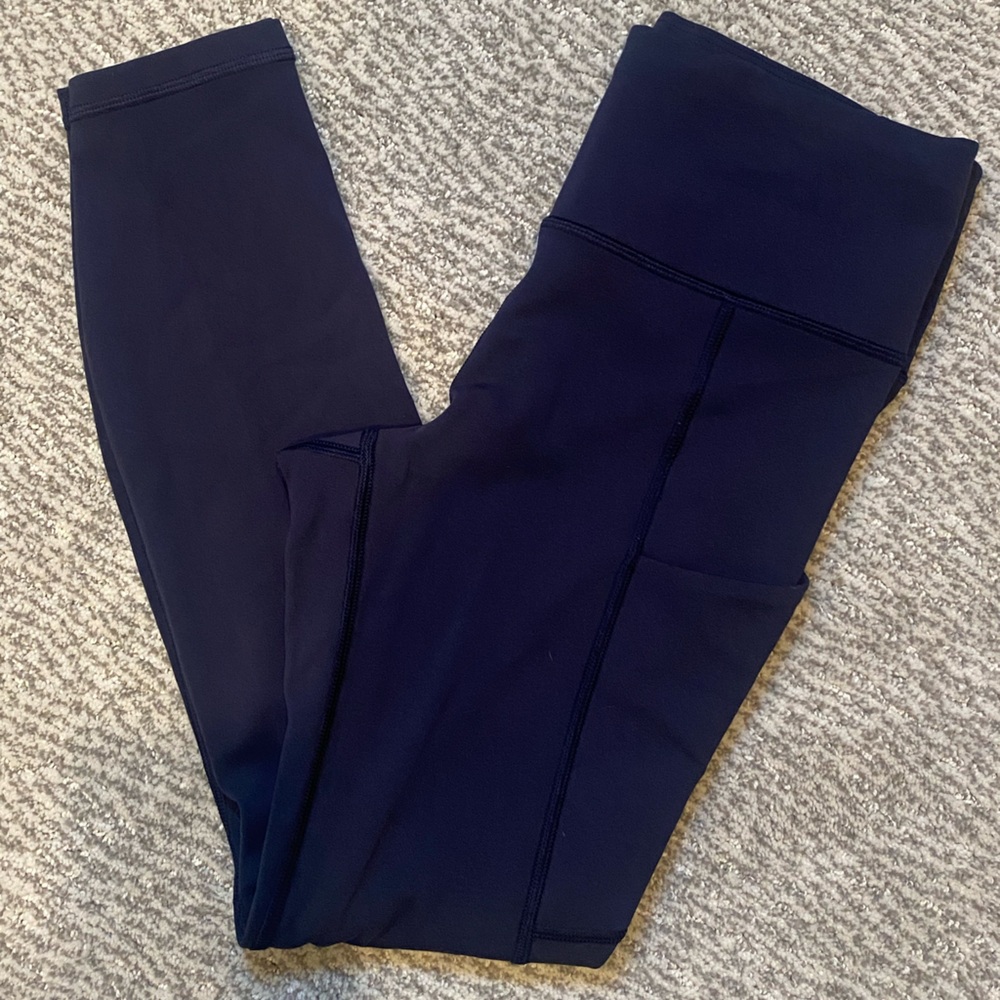 Athleta High Rise Navy Leggings 7/8 length Size Small with Side Pockets